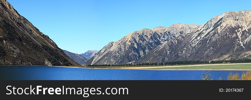 Panorama southern alpine alps mountain range Lake Pearson Arthur's pass National Park New Zealand. Panorama southern alpine alps mountain range Lake Pearson Arthur's pass National Park New Zealand