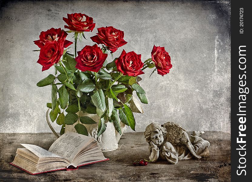 Bouquet of red roses and book. Bouquet of red roses and book