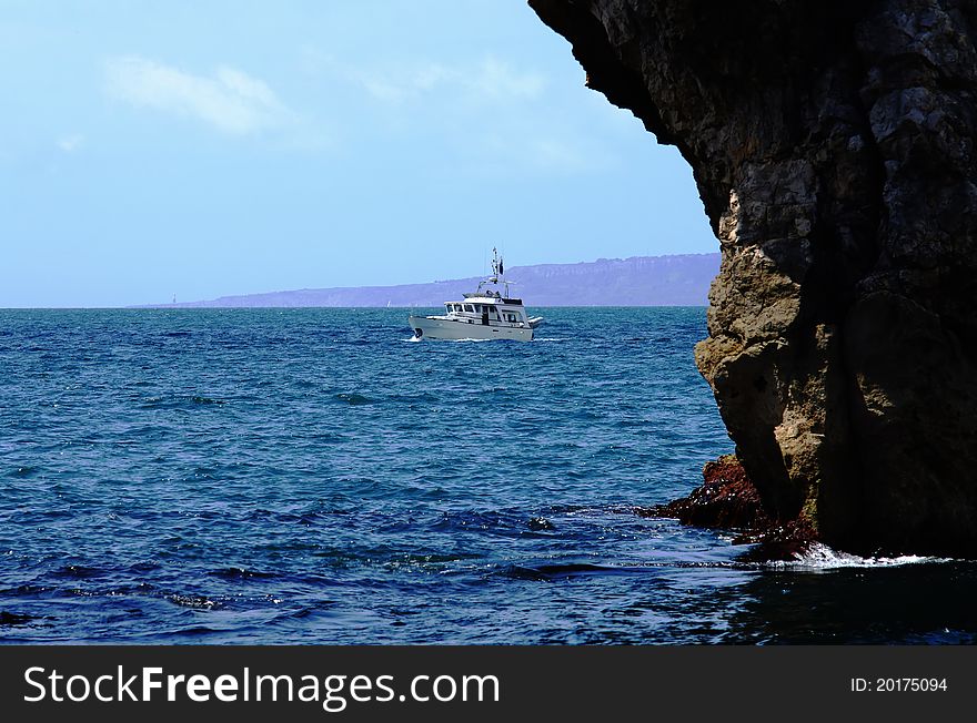 Sport fishing boat on the sea in sunny day