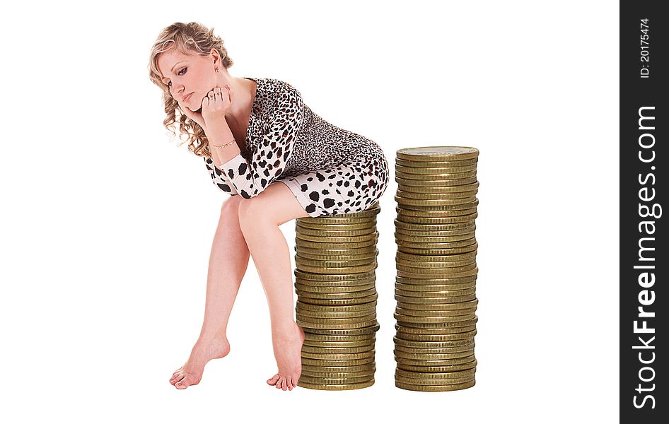 Woman sitting on a pile of coins. Woman sitting on a pile of coins
