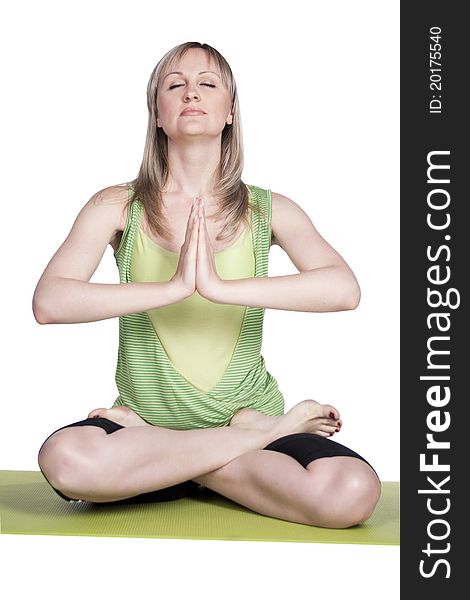 Pretty blond girl doing yoga