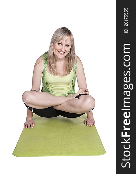 Pretty blond girl doing yoga