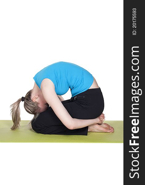 Pretty blond girl doing yoga