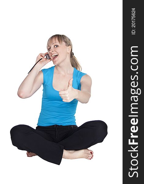 Girl talking on the phone and showing thumb up