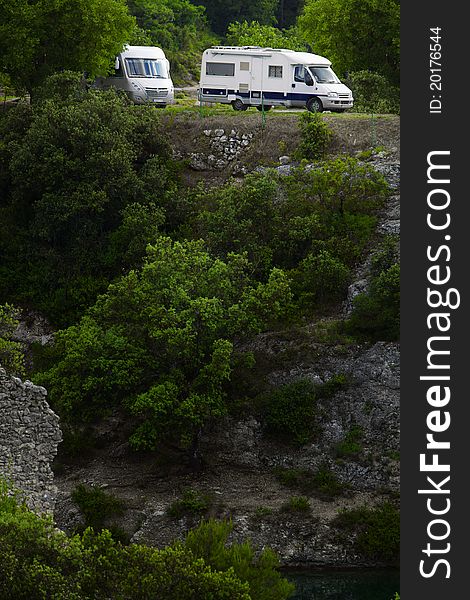 Campervan on road and forest