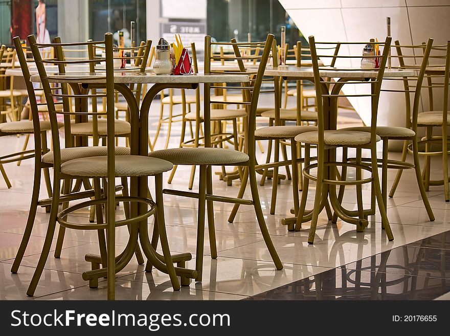 Cafe tables and chairs close to  shopping center. Cafe tables and chairs close to  shopping center.