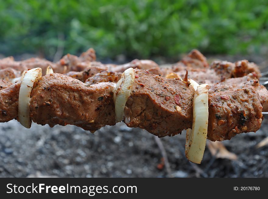 Barbecue - fry beef meat and onion