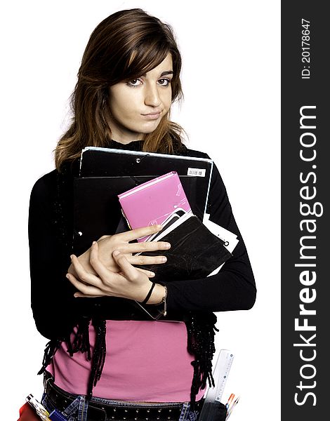 View of a teenager school girl holding books on a white background. View of a teenager school girl holding books on a white background.