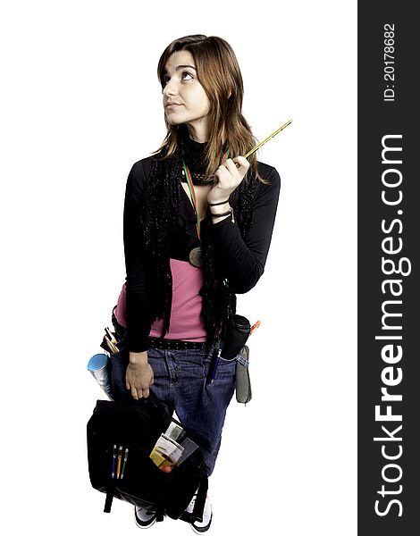 View of a teenager school girl with school stuff on a white background. View of a teenager school girl with school stuff on a white background.