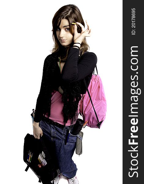 View of a teenager school girl with school stuff on a white background. View of a teenager school girl with school stuff on a white background.