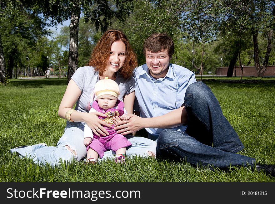 Young Family In Park