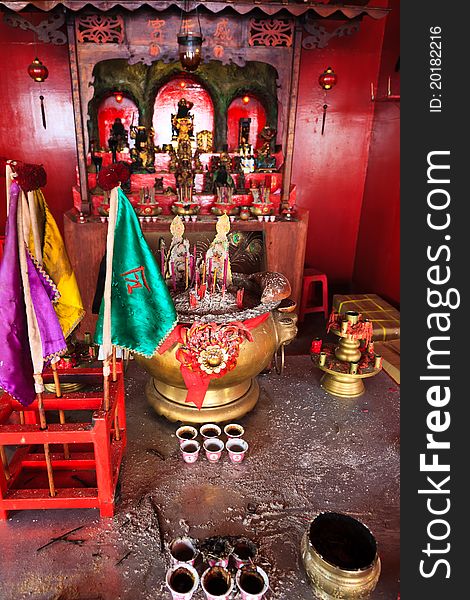 Small chinese alter with insence burning for praying. Small chinese alter with insence burning for praying