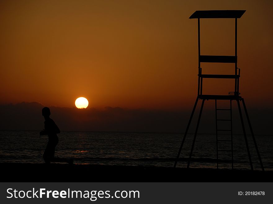 A beautiful Mediterranean sunset on the beach of Trapani (Sicily)