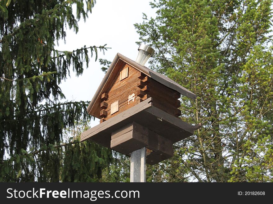 DSLR photo of a bird house.