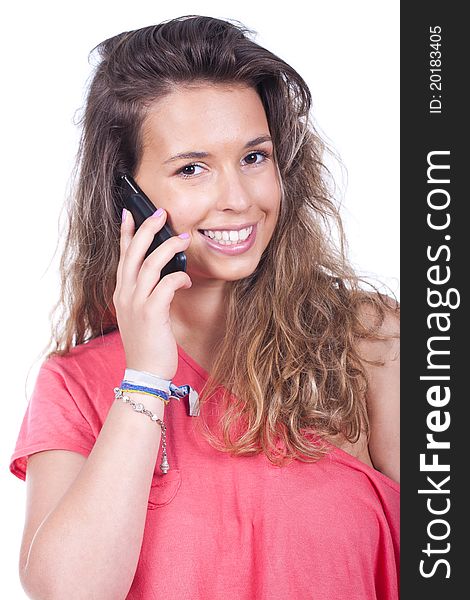 Young and beautiful woman talking on the phone and smiling