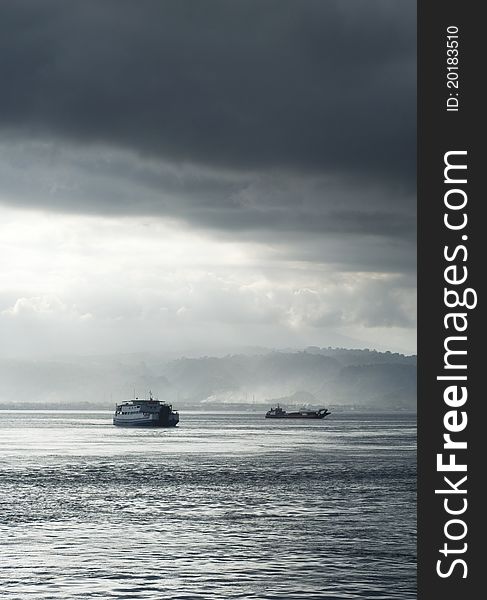 Ferry from Java to Bali under the storm. Indonesia