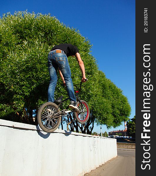 Boy Jumping From Wall On Bmx
