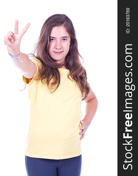 Beautiful smiling teenage girl making victory sign with her hand and smiling