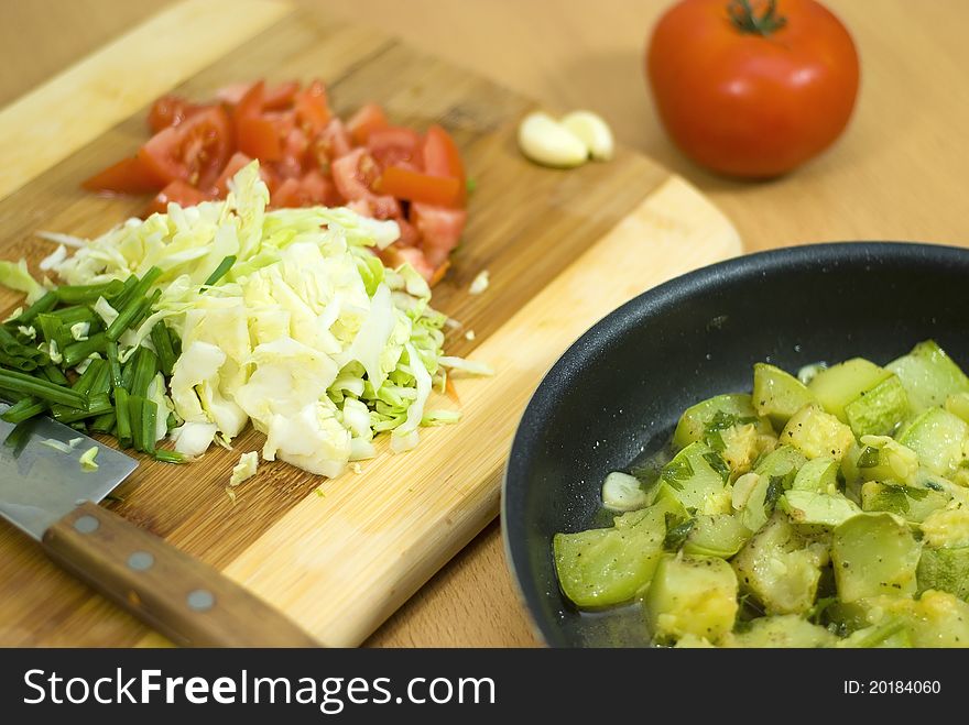 Sliced â€‹â€‹vegetables on a cutting board. Sliced â€‹â€‹vegetables on a cutting board