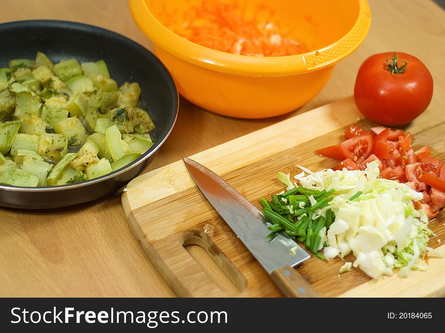 Sliced â€‹â€‹vegetables on a cutting board. Sliced â€‹â€‹vegetables on a cutting board