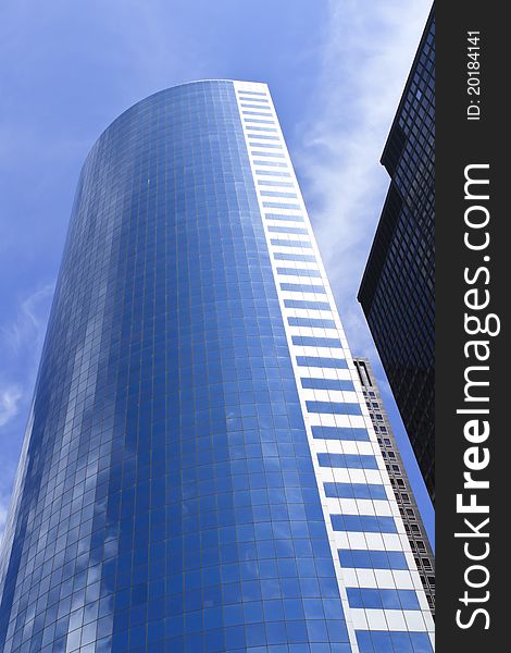 Beautiful buildings in downtown, blue sky background. Beautiful buildings in downtown, blue sky background