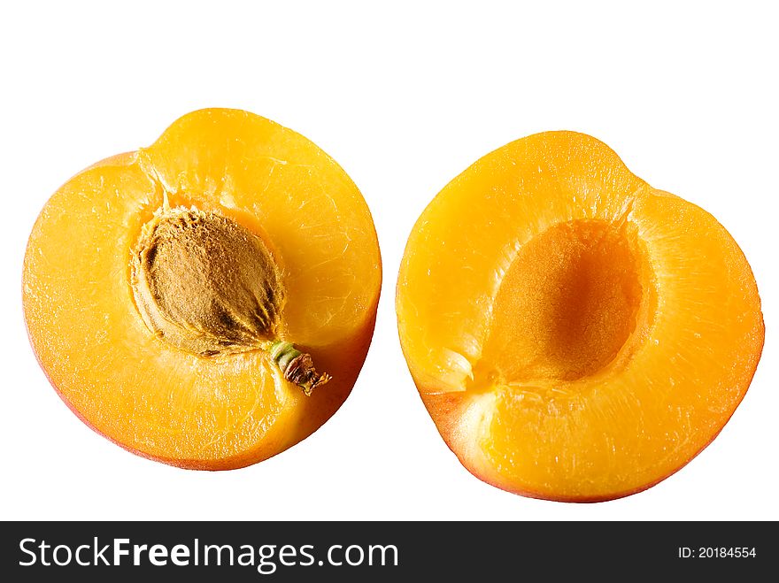 Apricot cut in half isolated on white. Apricot cut in half isolated on white