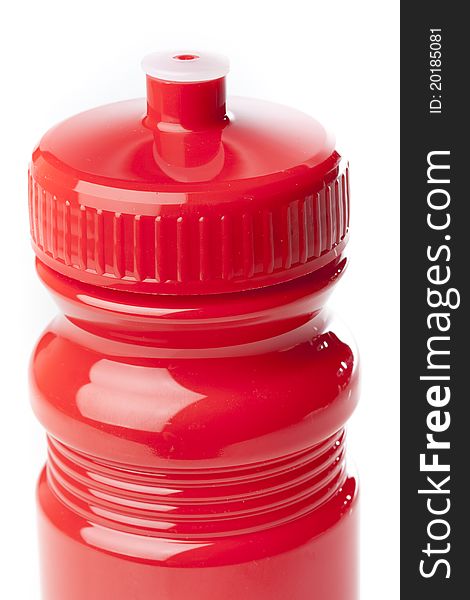 A red water bottle against a white background