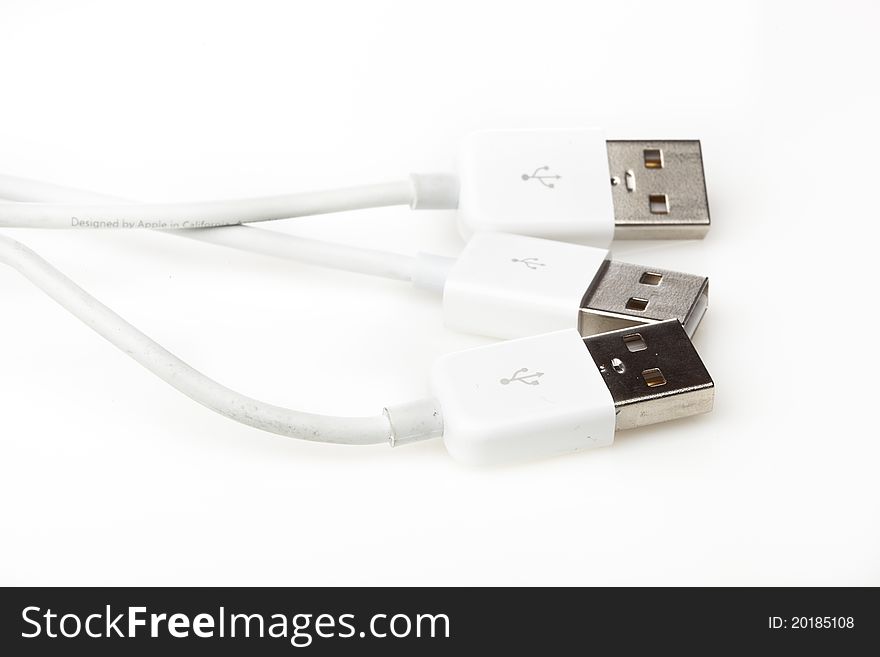 A white USB cable against a white background