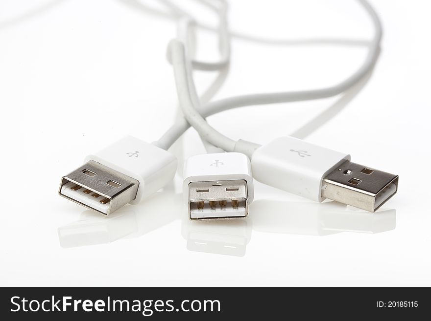 A white USB cable against a white background