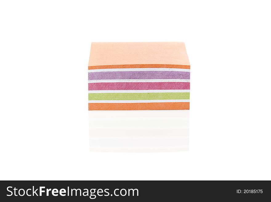 A colorful note pad against a white background