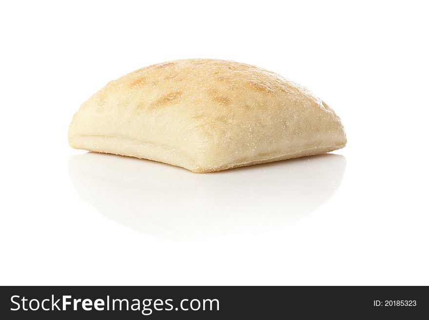Fresh ciabatta bread against a white background