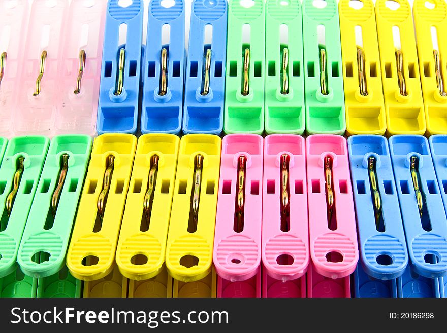 Close up of many colorful clothes pins