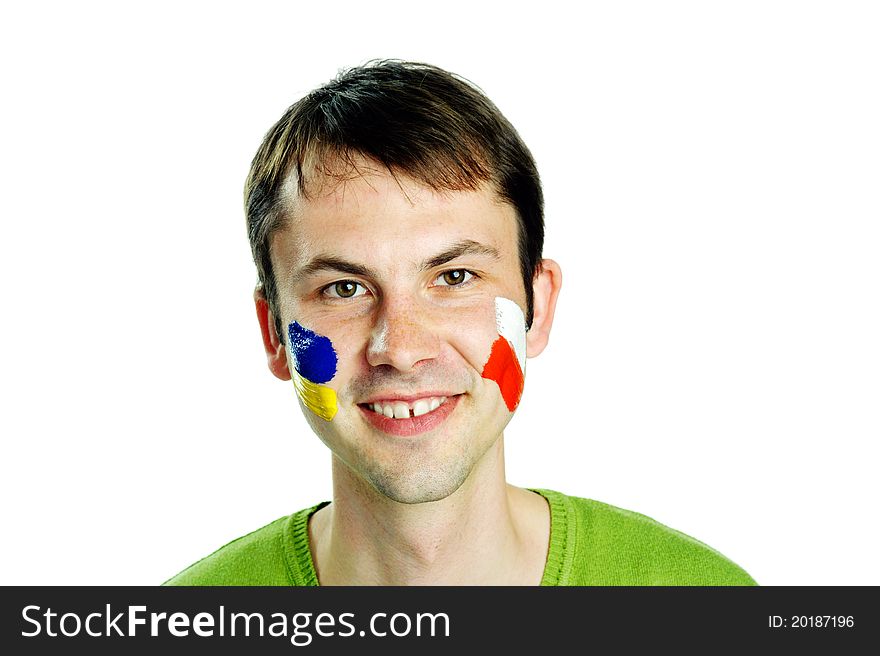 An image of football fan with flags on face. An image of football fan with flags on face