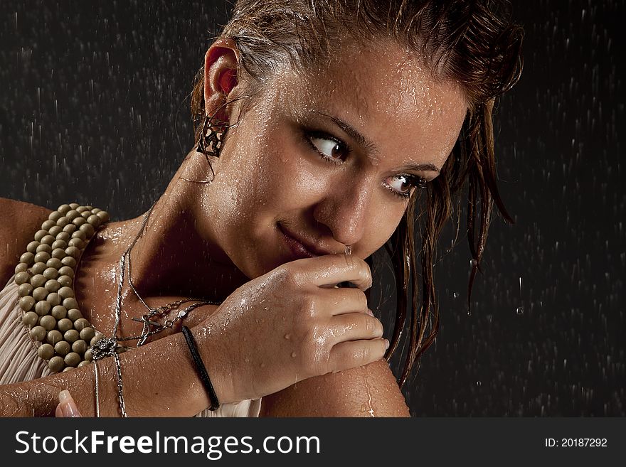 Pretty interesting wet girl walking in the rain