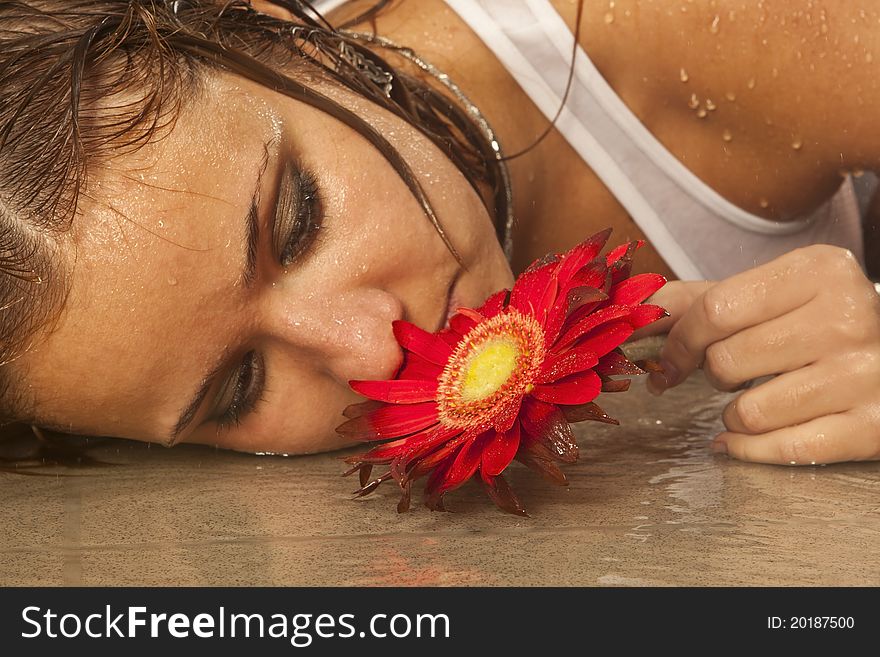 Beautiful interesting girl wet in the rain