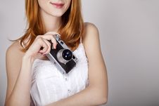 Redhead Girl In White Dress With Vintage Camera. Stock Photo Redhead Girl In White Dress With Vintage Camera. Stock Photo