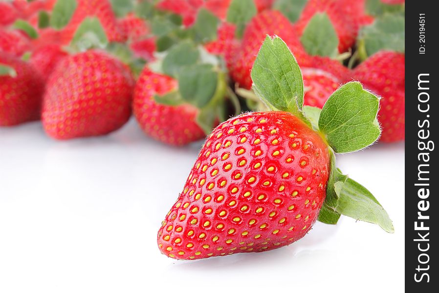A bunch of fresh strawberry on white background. A bunch of fresh strawberry on white background