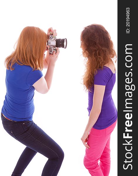 Two young girls are having fun in front of the camera. Two young girls are having fun in front of the camera