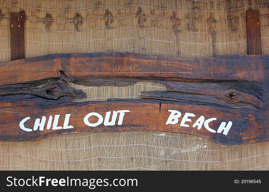 Wooden sign on the beach