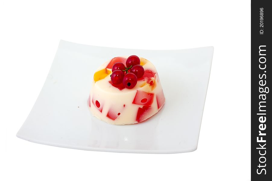 Fruit cake on a white plate