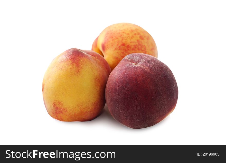 Peaches isolated over white background