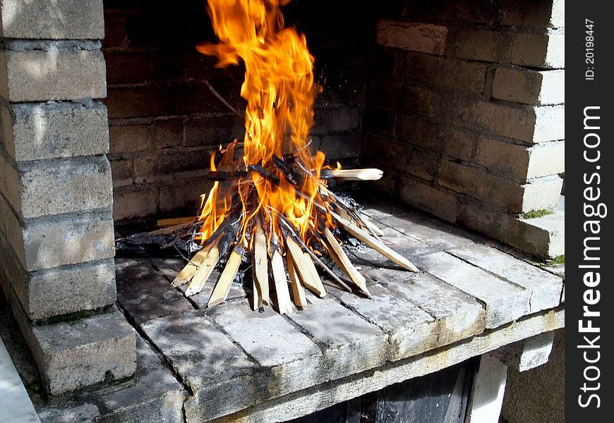 Wood fire for barbecue outdoors