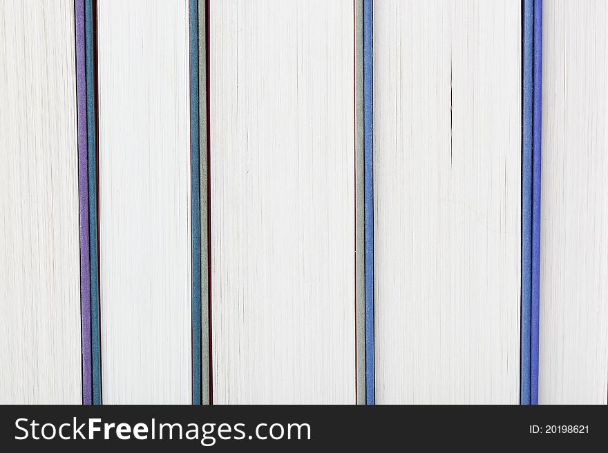 A group of books against a white background