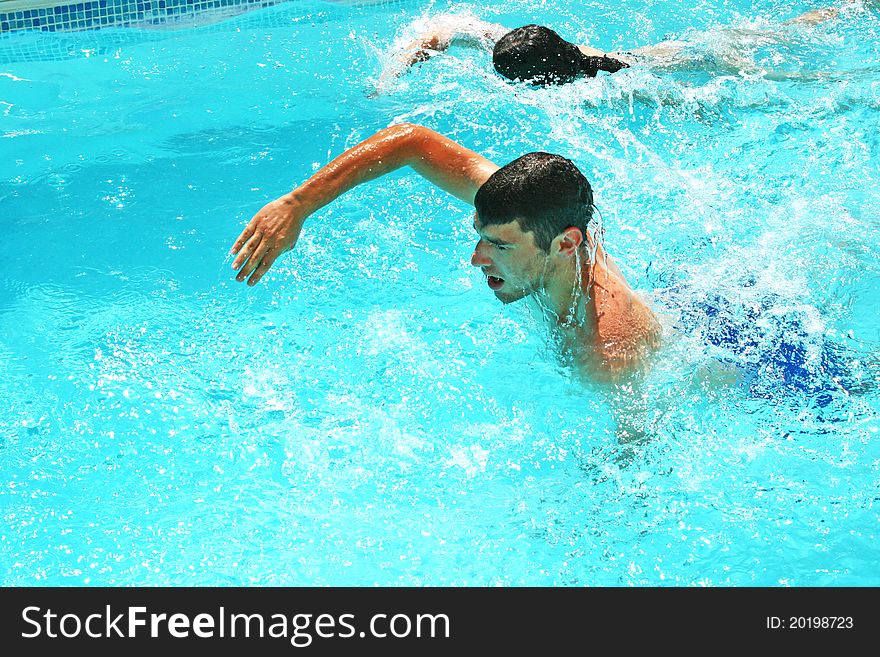 Couple having fun in swimming pool. Couple having fun in swimming pool.