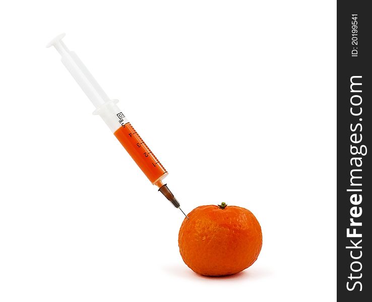 Fresh orange tangerine and syringe with orange liquid. Fresh orange tangerine and syringe with orange liquid