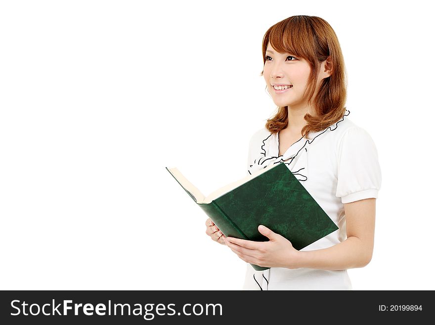 Young business woman holding a book