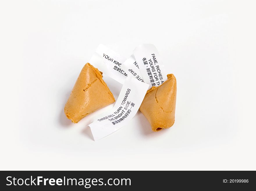 Fortune cookie with several lucky paper stripes. Fortune cookie with several lucky paper stripes.