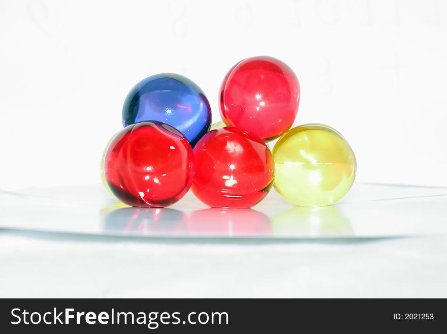 Blue red yellow spheres on a white background. Blue red yellow spheres on a white background