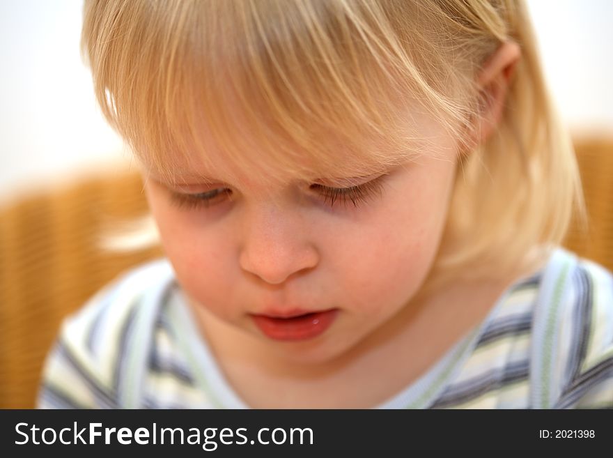 Face of a little girl and a white background