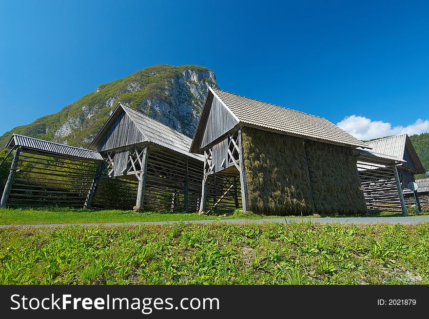 Group of old wooden barns near lake Bohinj in Slovenia